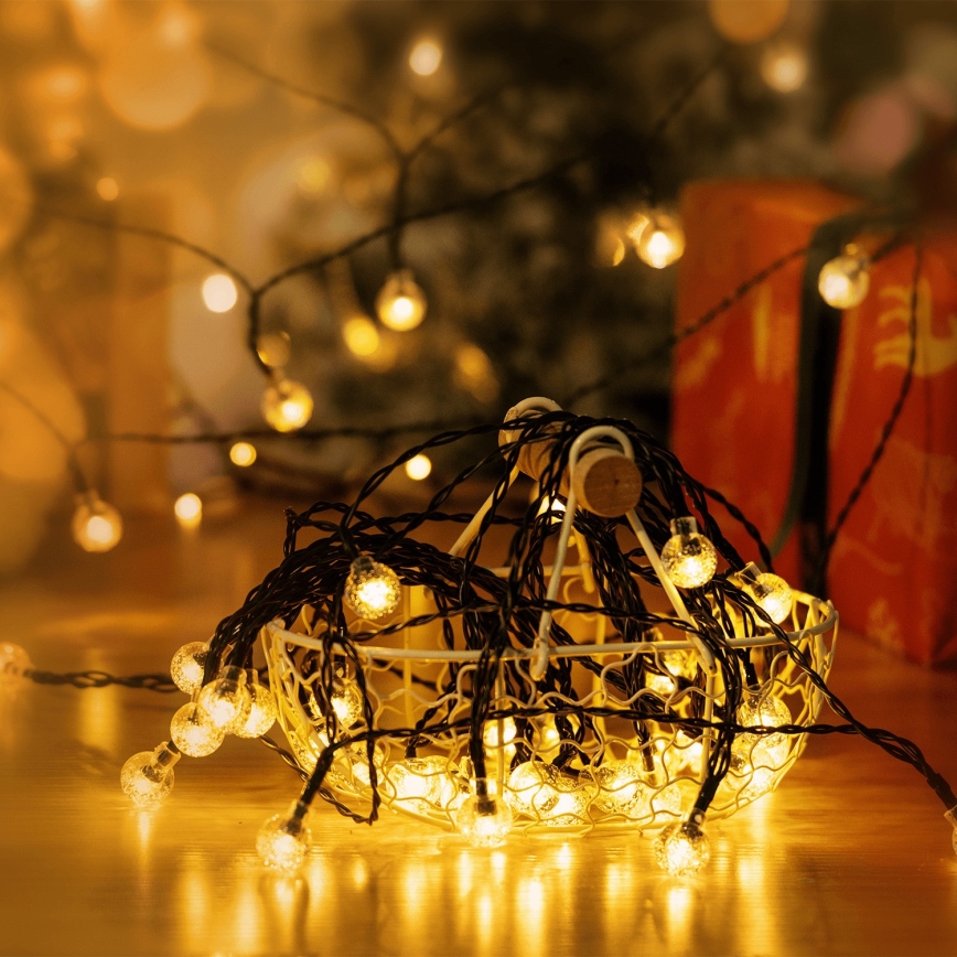 Aigostar – Декоративна LED гірлянда на сонячній батареї, 50xLED/8 режимів, 12 м, тепле біле світло, IP65 800 mAh