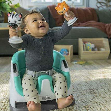 Baby Einstein - Стульчик-бустер для кормления с 2 игрушками 2в1 DINE&DISCOVER