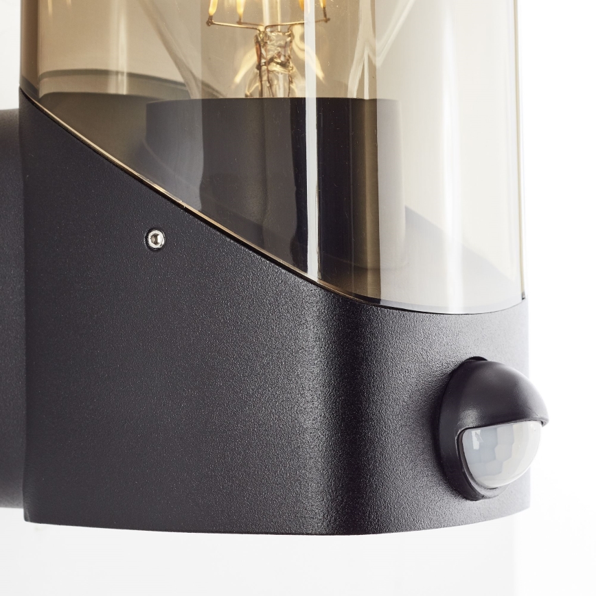 Brilliant - Вуличний настінний світильник з датчиком MINOU 1xE27/10W/230V IP44 чорний/димчастий