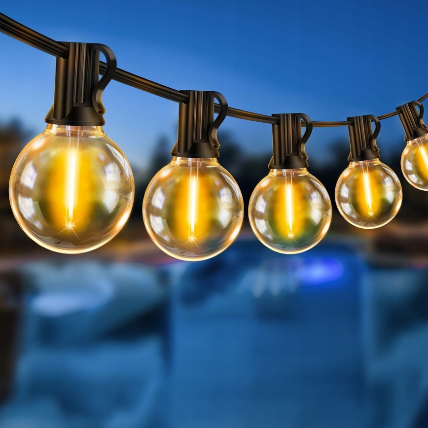 Диммируемая светодиодная уличная декоративная гирлянда LED 25xE12/1W/24/230V 17,5 м IP65 черная + пульт дистанционного управления