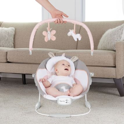 Ingenuity - Детское вибрирующее кресло-шезлонг с музыкой FLORA THE UNICORN 3xC