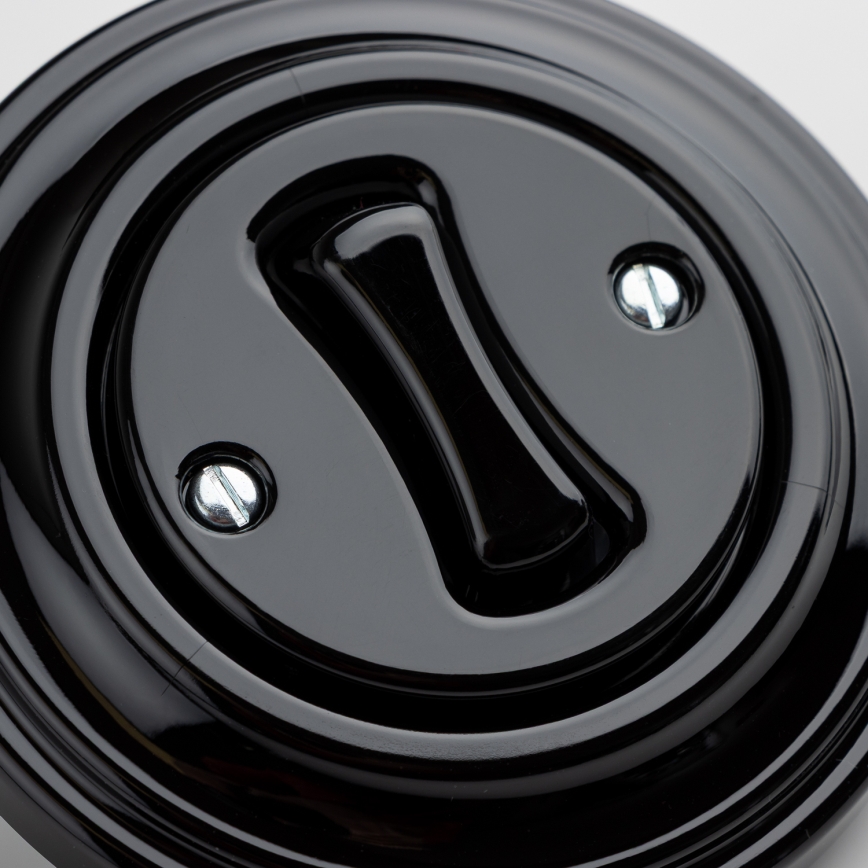 Kliklap - ретро-кнопка в рамке, чёрная