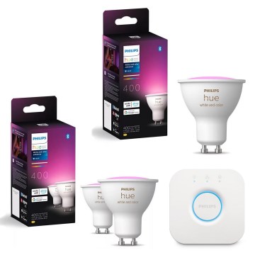 Komplekt iz 3 zatemnjuvanykh LED RGBW-lamp Philips Hue WHITE AND COLOR AMBIANCE GU10/4,2W/230V 2000–6500K + Hue Bridge