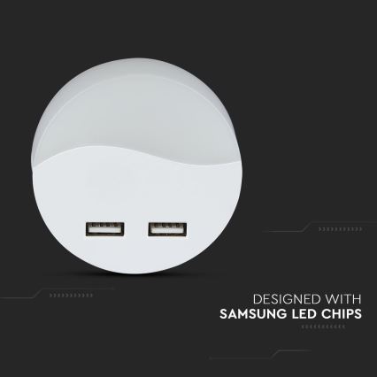 LED Нічник з датчиком освітленості в розетку 2xUSB LED/0,45W/230V 3000K