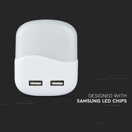 LED Нічник з датчиком освітленості в розетку 2xUSB LED/0,45W/230V 3000K