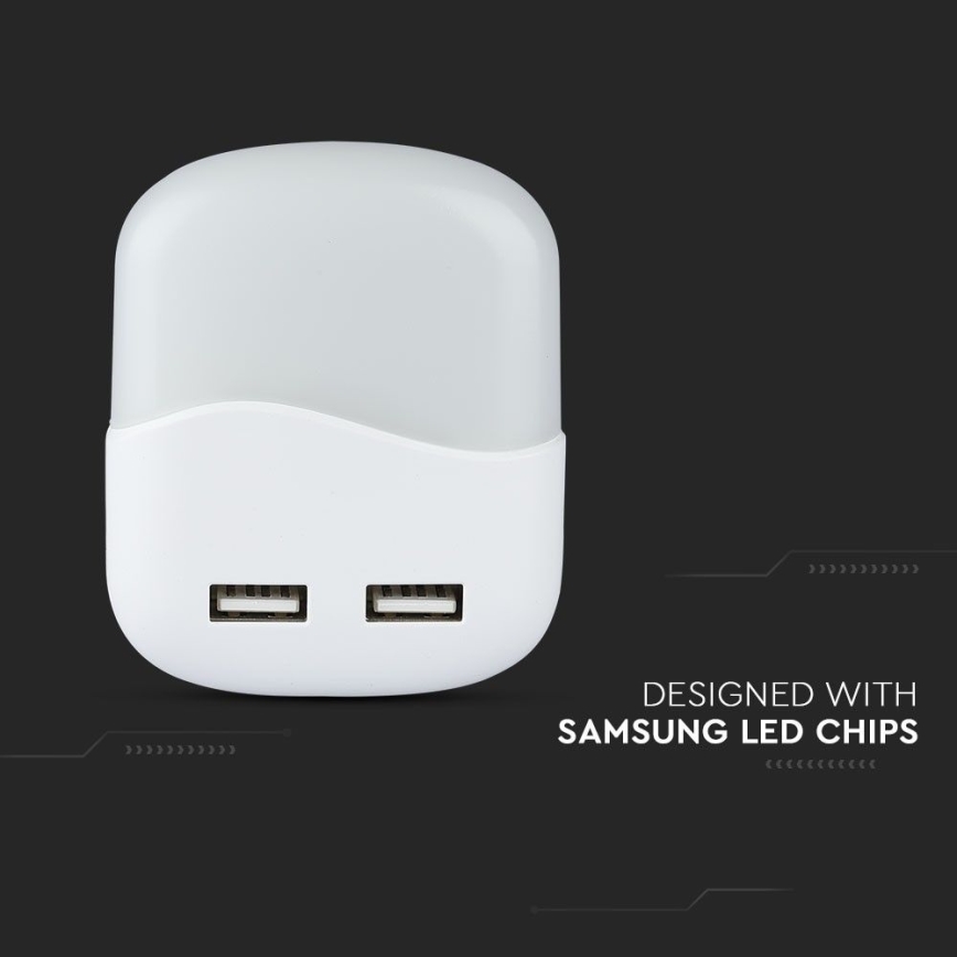 LED Нічник з датчиком освітленості в розетку 2xUSB LED/0,45W/230V 3000K