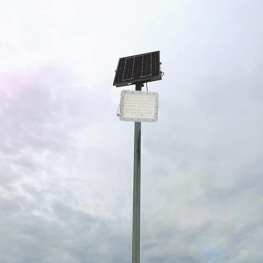 Світлодіодний зовнішній димований сонячний прожектор LED/15W/3,2V IP65 6400K 12000 mAh білий + дистанційне керування