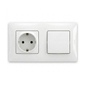 Legrand - Розетка для дому SCHUKO та однополюсний вимикач № 1 з рамкою NILOE 250V біла