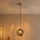 Люстра на тросі CRISTAL 1xE14/15W/230V латунь/димчасто-чорна