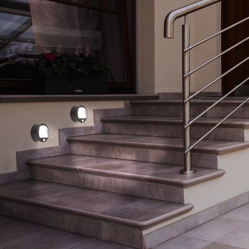Rabalux - Уличный светодиодный настенный светильник с датчиком LED/1,5W/3xAA IP44 черный