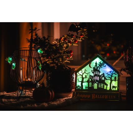 LED Прикраса HALLOWEEN LED/2xAA/кольоровий будинок з привидами