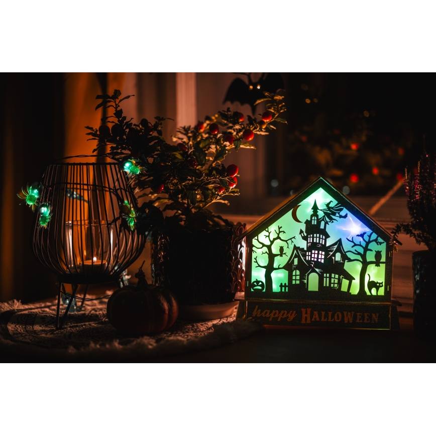 LED Прикраса HALLOWEEN LED/2xAA/кольоровий будинок з привидами