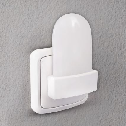 Светодиодный навигационный RGB-светильник в розетку с датчиком LED/0,5W/230V