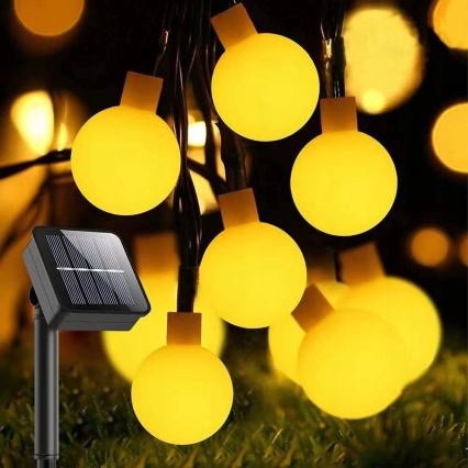 Сонячна декоративна LED гірлянда 30xLED/8 функцій 500 mAh 6,5 м IP67 теплий білий