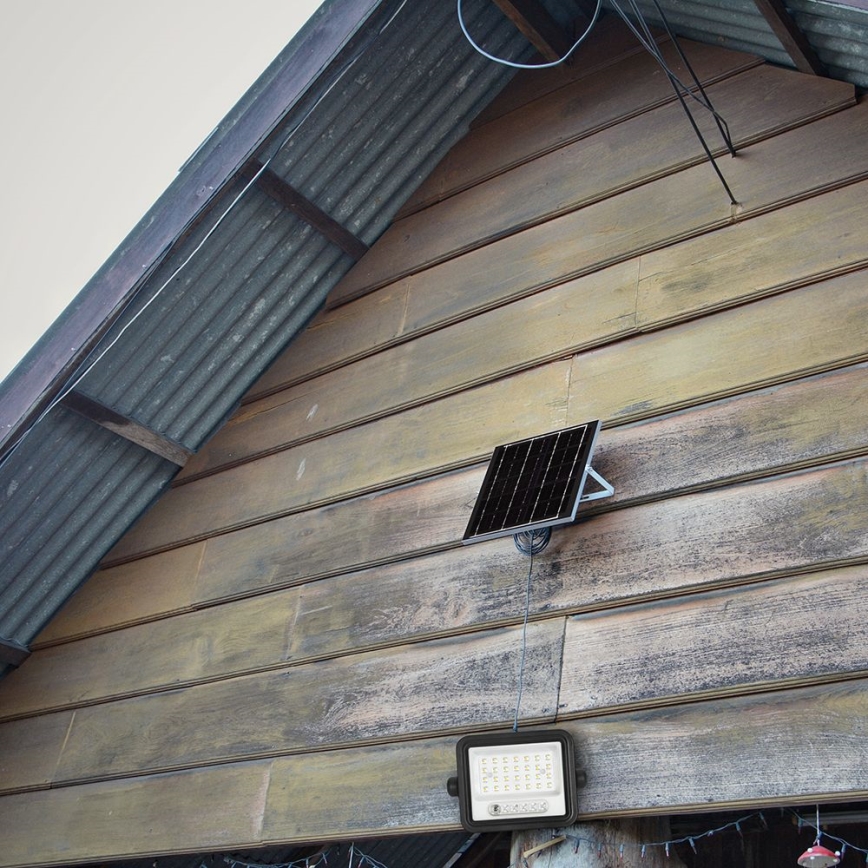 Сонячний LED-прожектор з регульованою яскравістю LED/50W/3,2V 2000-8000K IP65 3800 mAh чорний + пульт дистанційного керування