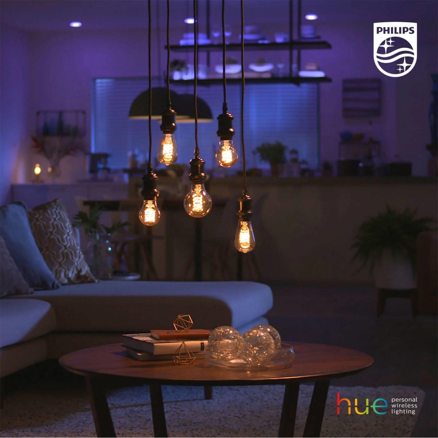 Светодиодная лампочка с регулированием яркости Philips Hue WHITE FILAMENT A60 E27/7W/230V 2100K