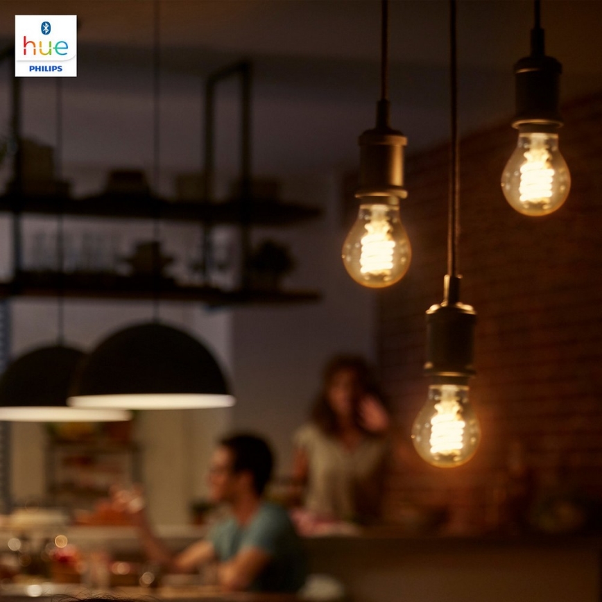 Светодиодная лампочка с регулированием яркости Philips Hue WHITE FILAMENT G93 E27/7W/230V 2100K