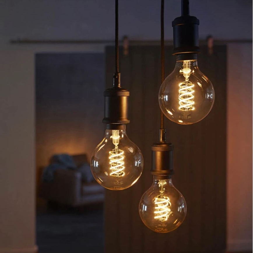 Светодиодная лампочка с регулированием яркости Philips Hue WHITE FILAMENT G93 E27/7,2W/230V 2100K