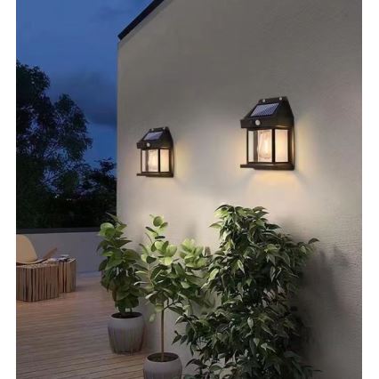 Светодиодный настенный светильник на солнечной батарее с датчиком LANTER LED/1W/3,7V 1200 mAh IP44 черный