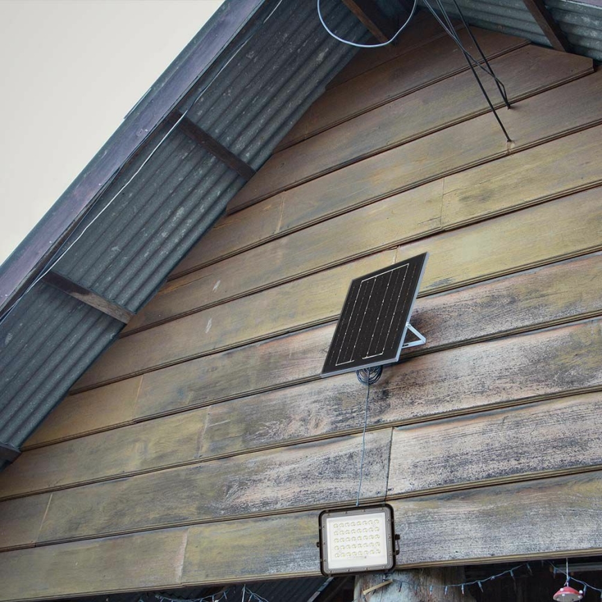 Светодиодный уличный прожектор на солнечной батарее с регулированием яркости LED/10W/3,2V IP65 4000K 6000 mAh черный + дистанционное управление