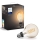 Светодиодная лампочка с регулированием яркости Philips Hue WHITE FILAMENT G93 E27/7,2W/230V 2100K