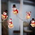 Светодиодная рождественская гирлянда с присосками 6xLED/2xAA 1,2м теплый белый снеговик