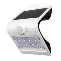 Светодиодный настенный светильник на солнечной батарее с датчиком LED/1.5W/3,7V IP65 белый
