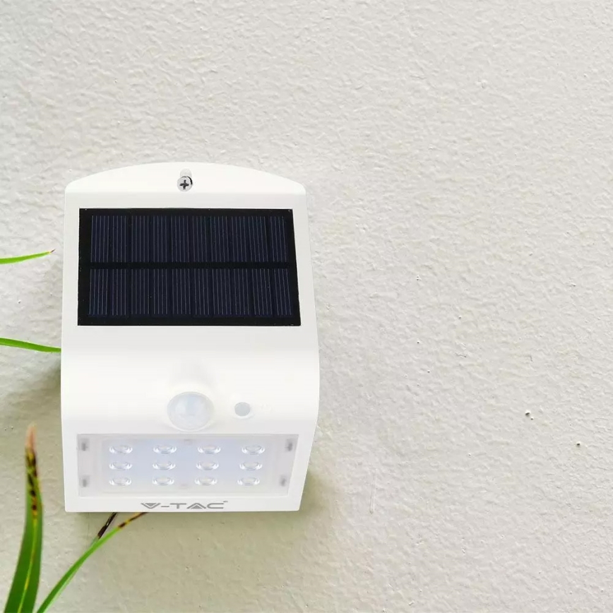Світлодіодний настінний світильник з датчиком на сонячній батареї LED/1.5W/3,7V IP65 1200 mAh