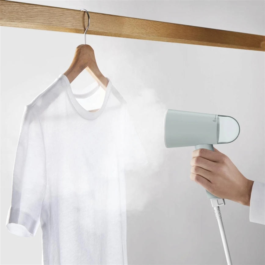 Tefal - Ручний відпарювач для одягу ORIGIN TRAVEL зелений