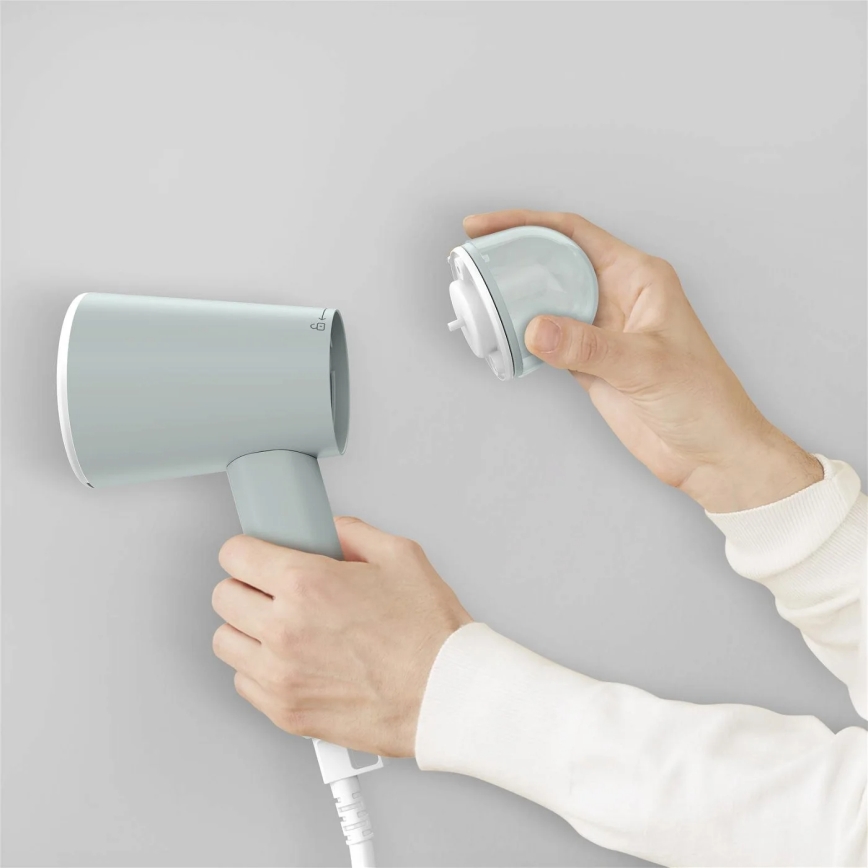 Tefal - Ручний відпарювач для одягу ORIGIN TRAVEL зелений