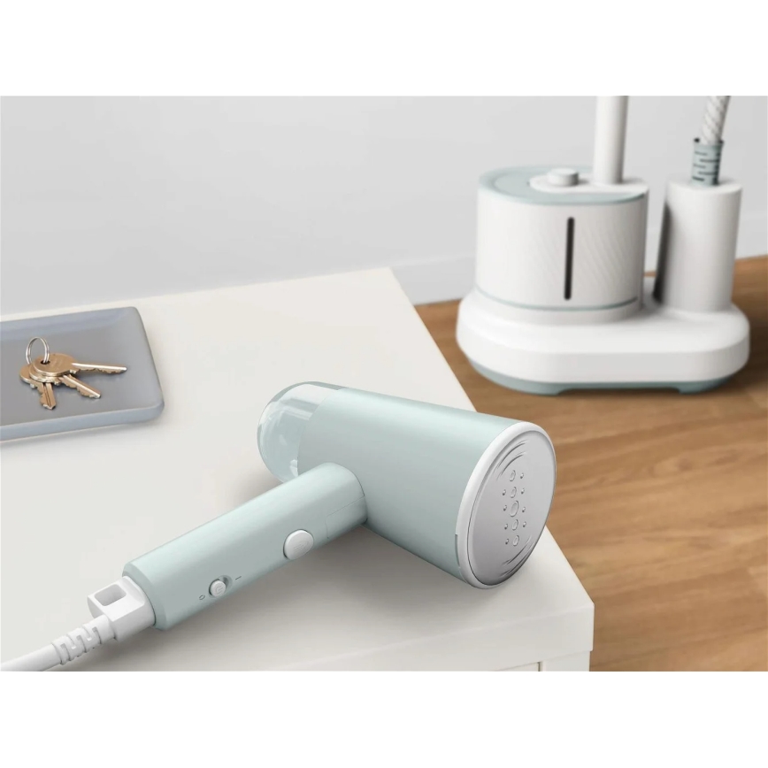 Tefal - Ручний відпарювач для одягу ORIGIN TRAVEL зелений